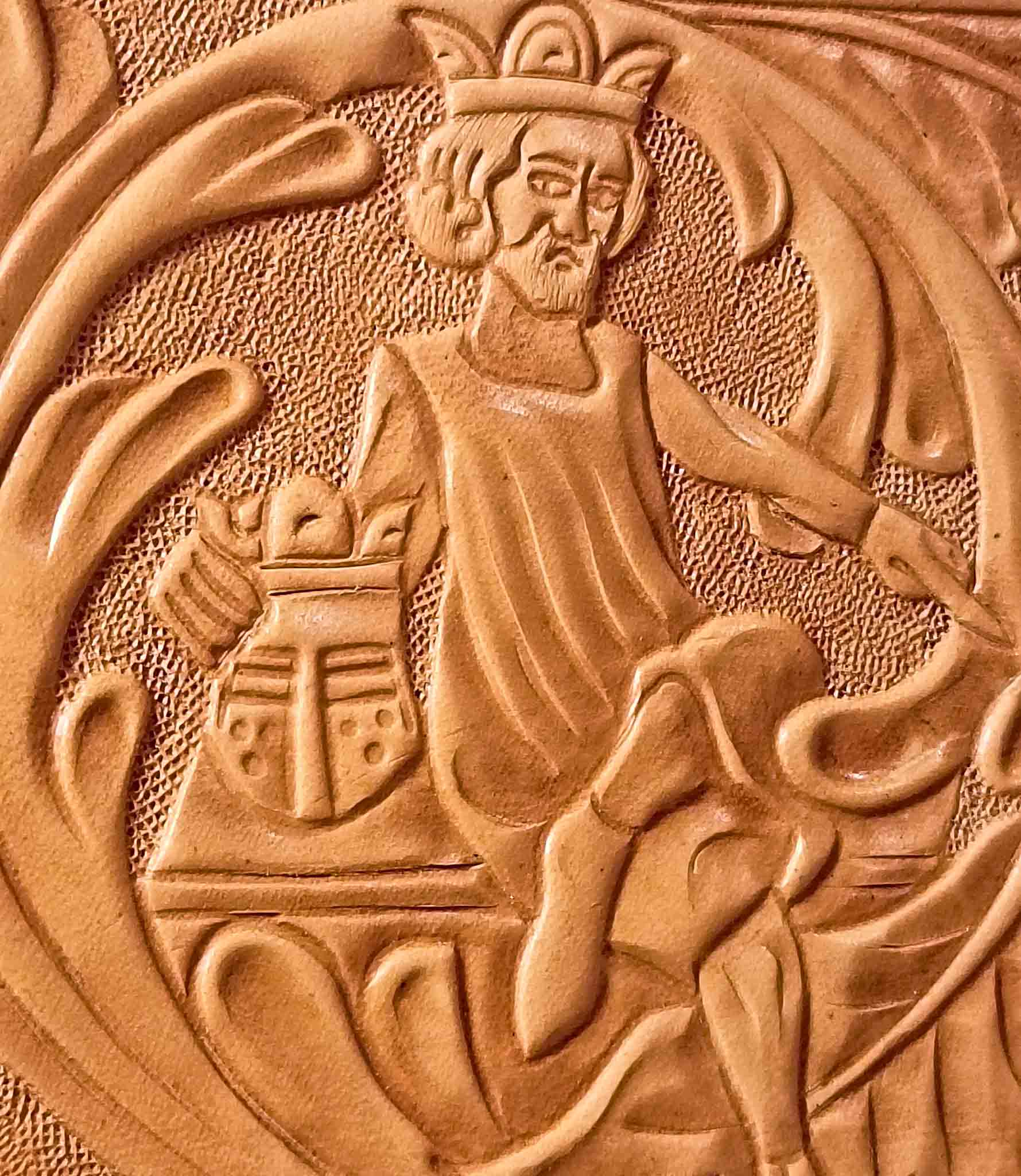 Detailed tooling of Charlemagne on vegetable-tanned leather, handmade by Michele Belvedere for Reliq Leather. Inspired by medieval iconography and crafted using traditional techniques.