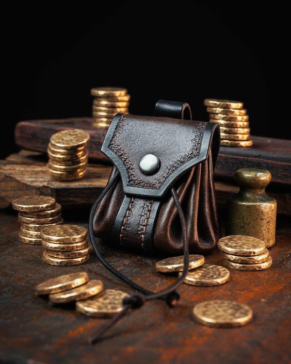 Dark brown and black medieval leather belt pouch with a textured flap and reliable snap closure, designed to securely hold coins or accessories on your belt.
