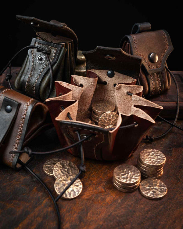 Open brown leather belt pouch revealing a spacious bellows interior filled with metal coins, designed for easy access during tabletop DnD and medieval festivals.
