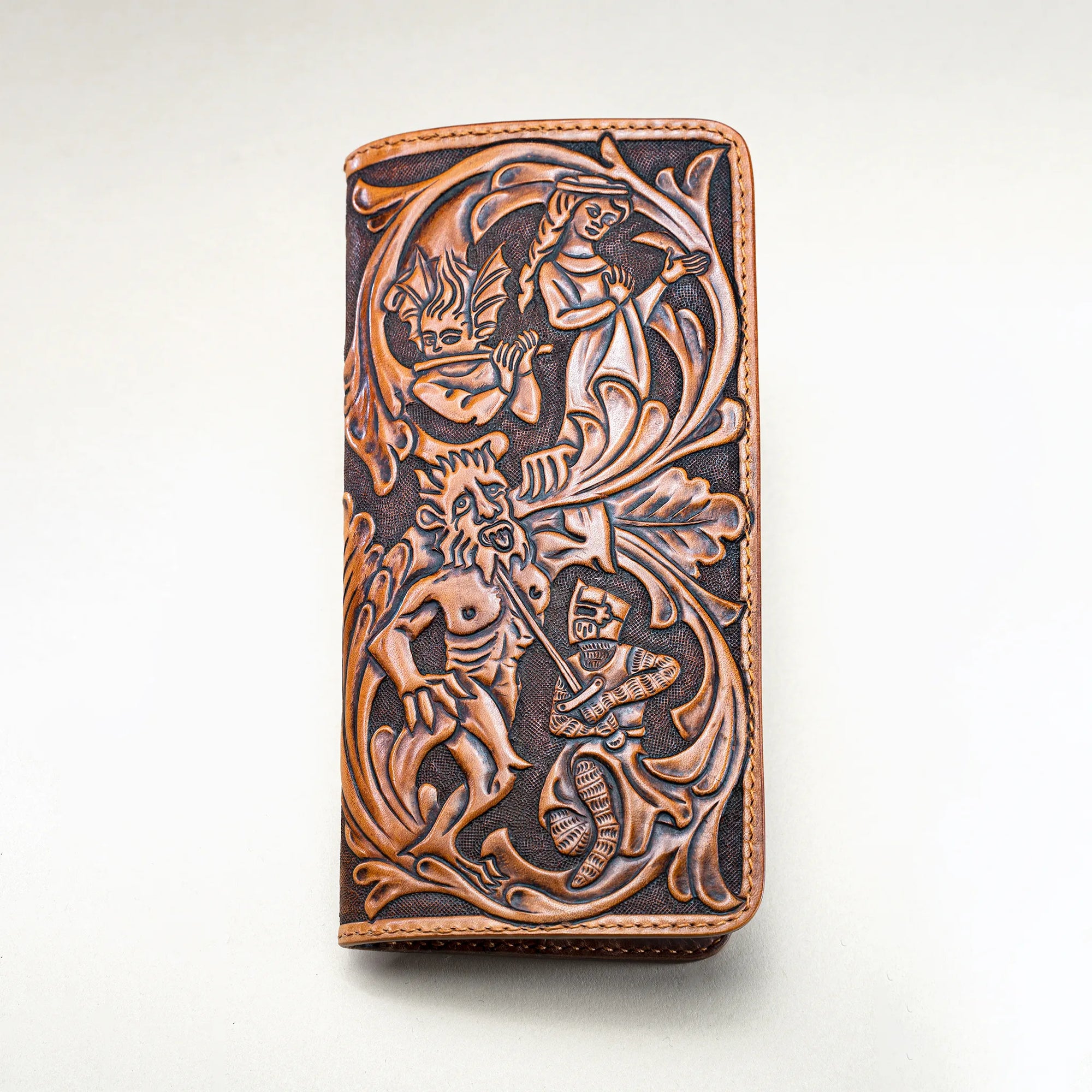 Hand-tooled leather long wallet by Reliq, depicting Huon de Bordeaux with characters in the style of 13th-century medieval manuscript illuminations.