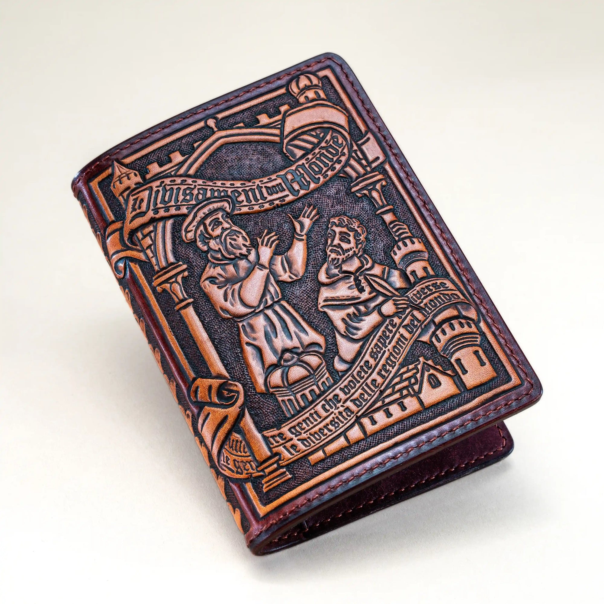 Hand-tooled passport wallet inspired by Marco Polo’s Il Milione, featuring figures and inscriptions tooled in the style of 15th-century manuscript illuminations.