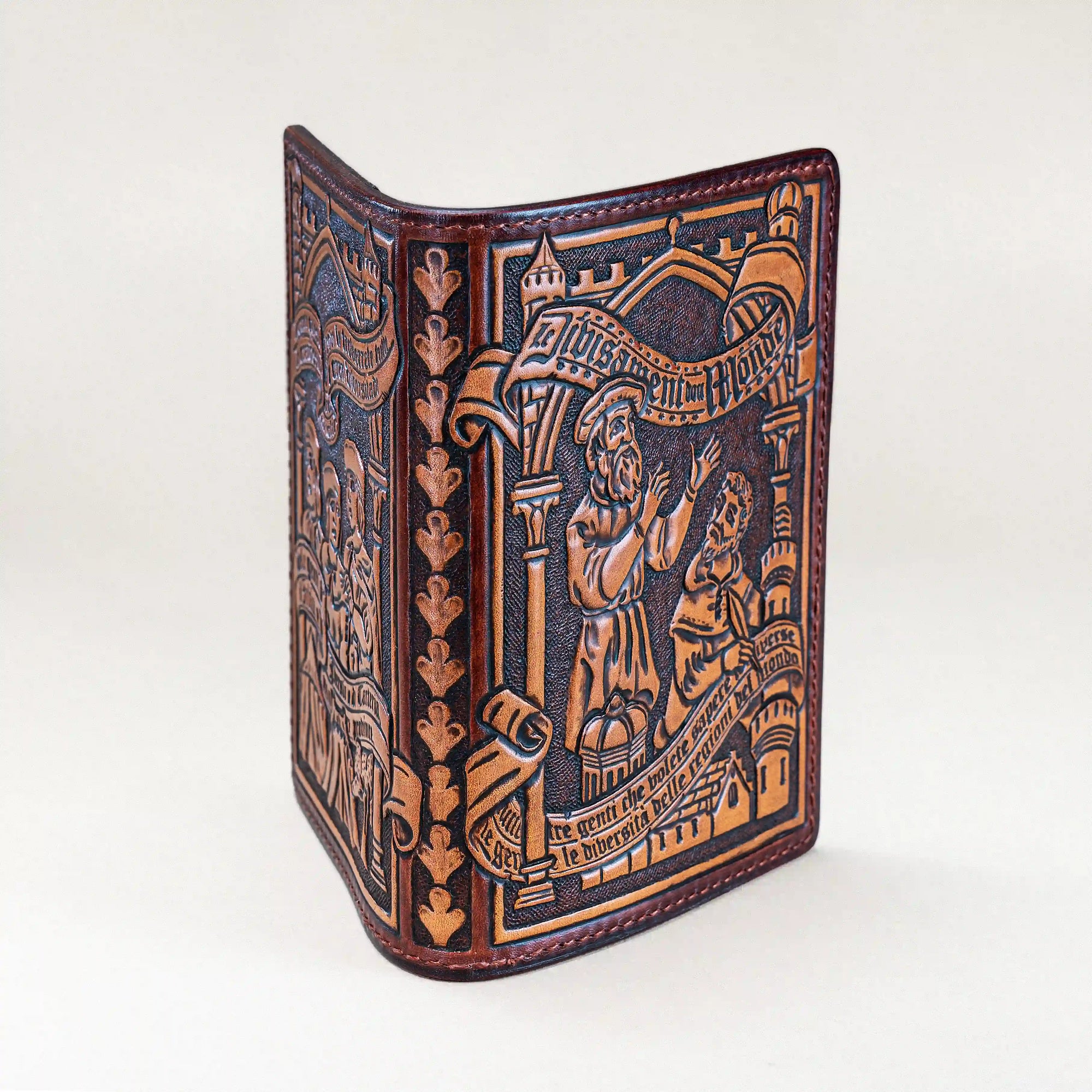 Handmade Italian leather passport wallet inspired by Il Milione, showing detailed tooling of Marco Polo’s journey in manuscript style.