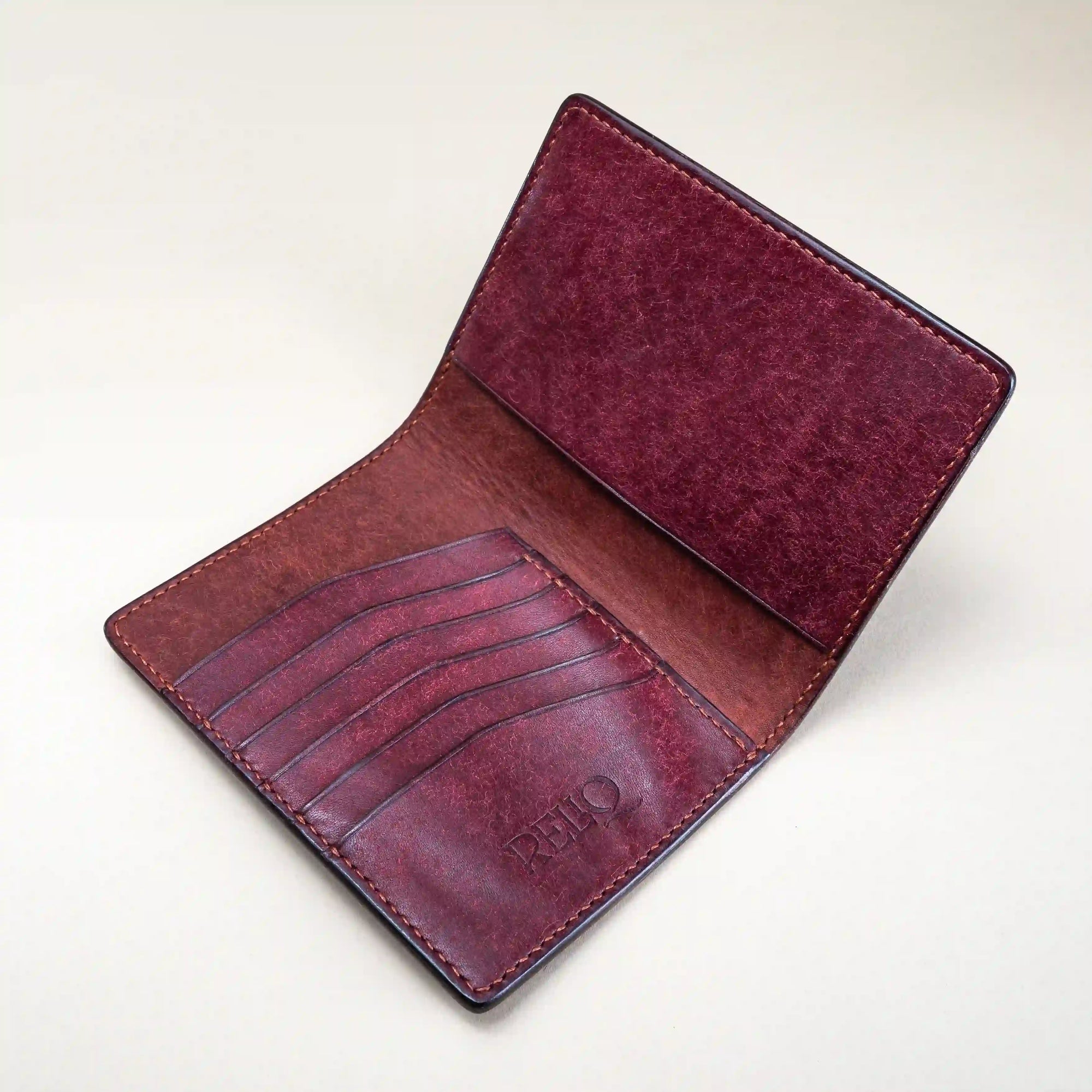 Interior of Reliq Leather passport wallet, hand-stitched in Italian vegetable-tanned leather with card slots and passport pocket.