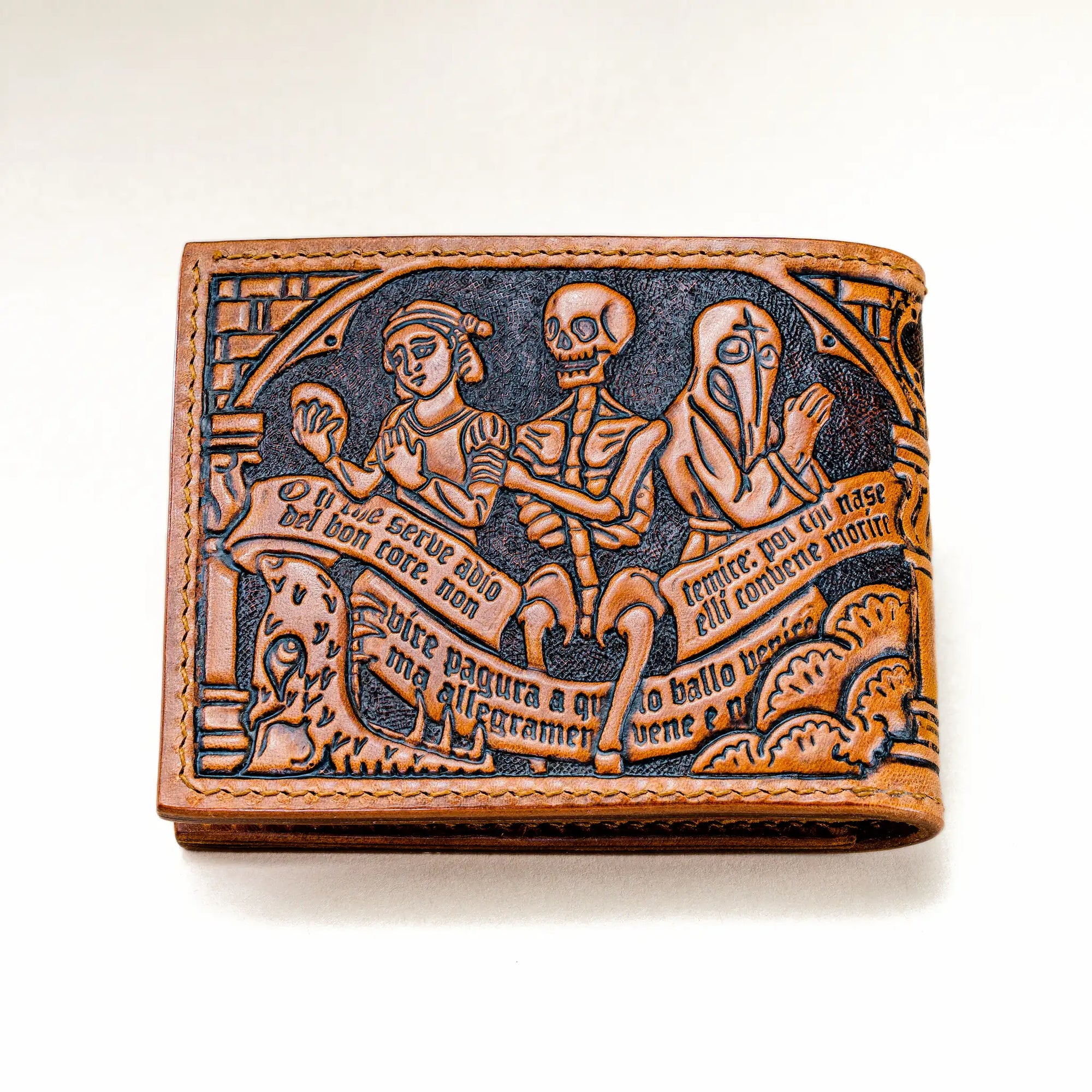 Back view of Reliq Leather Trionfo della Morte hand-tooled wallet, depicting the Danza Macabra procession inspired by the 1485 Clusone fresco, crafted in vegetable-tanned Italian leather.